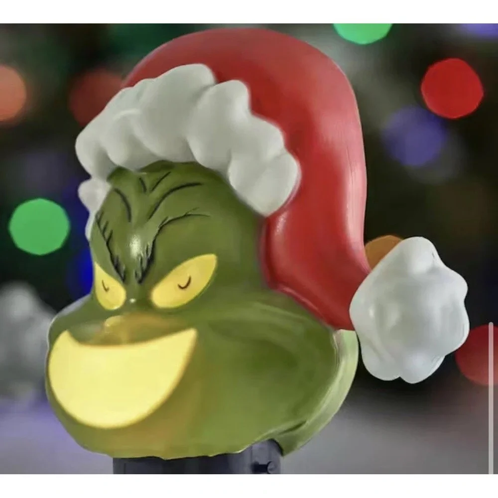 Gemmy Christmas Grinch Battery-Operated Pathway Stakes (4 Count) With Santa Hat‎